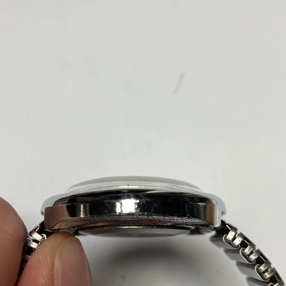 Vintage Timex black dial watch, works, stainless stretch bracelet